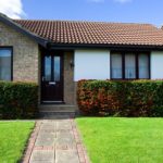 house with green yard 
